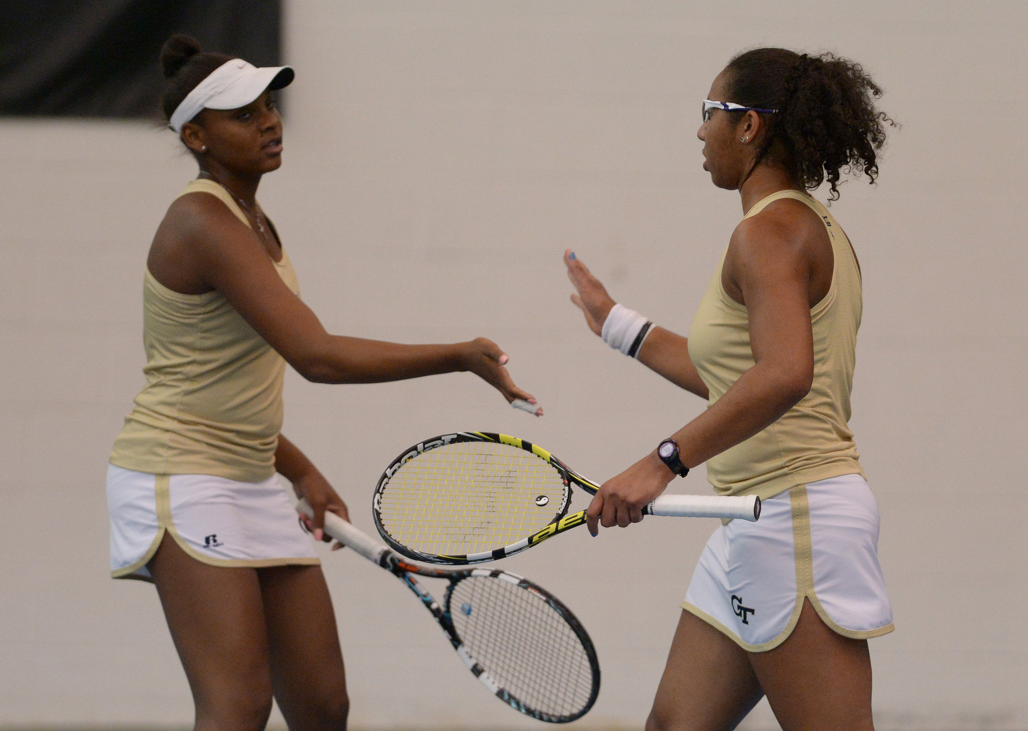 Georgia Tech's Johnnise Renaud and teammate Rasheeda McAdoo celebrate a point against Florida State during the 2015 ACC Women's Tennis Tournament in Chapel Hill, N.C., April. 25, 2015. (Photo by Sam Roberts, theACC.com)