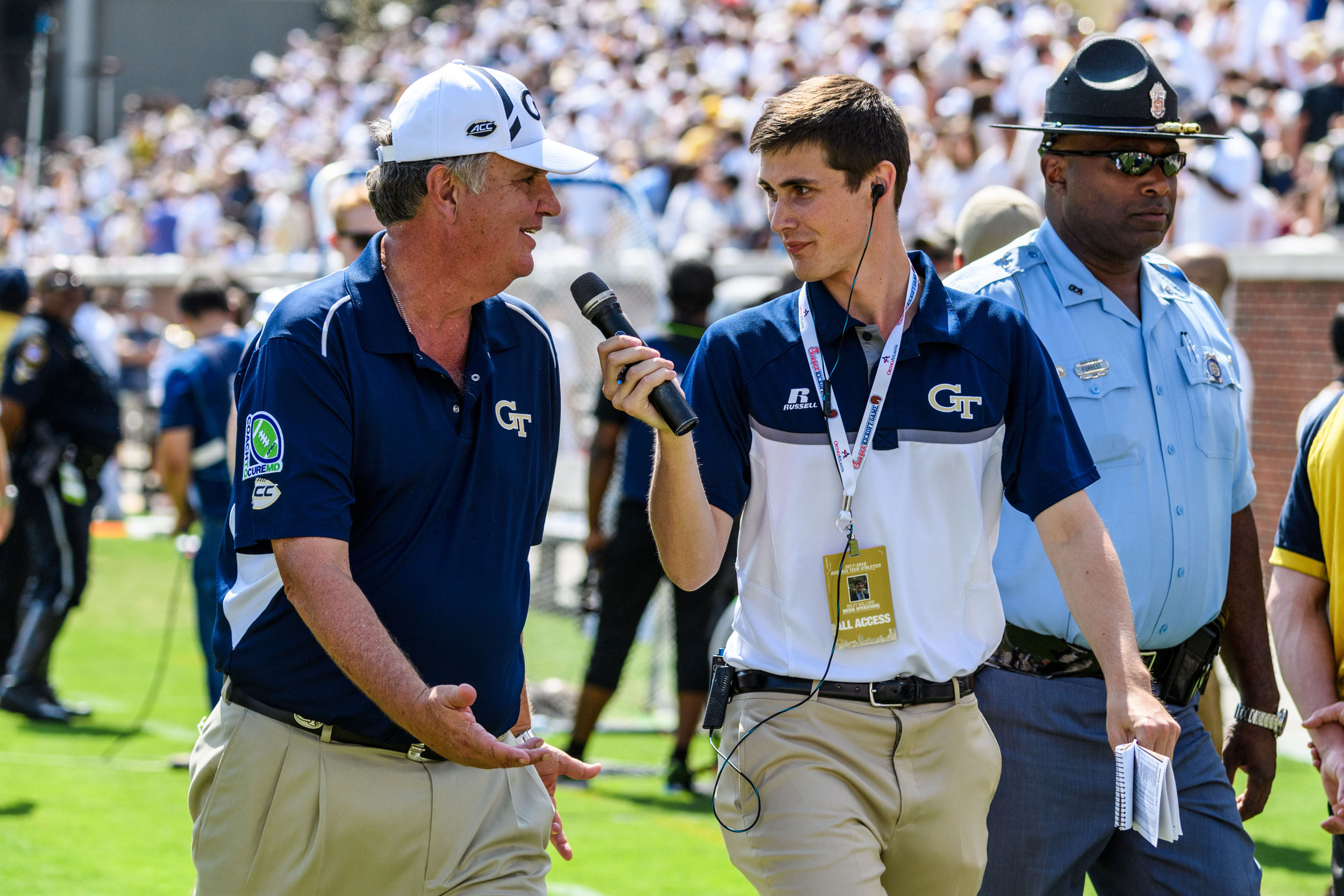 Wiley Ballard interviews Coach Paul Johnson at the half