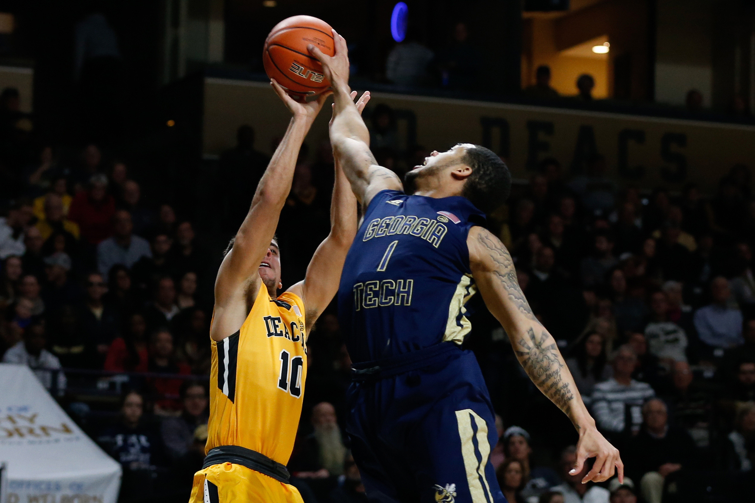 Georgia Tech Yellow Jackets guard Tadric Jackson (1) blocks the shot of Wake Forest Demon Deacons guard in the first half at Lawrence Joel Veterans Memorial Coliseum. Jeremy Brevard-USA TODAY Sports