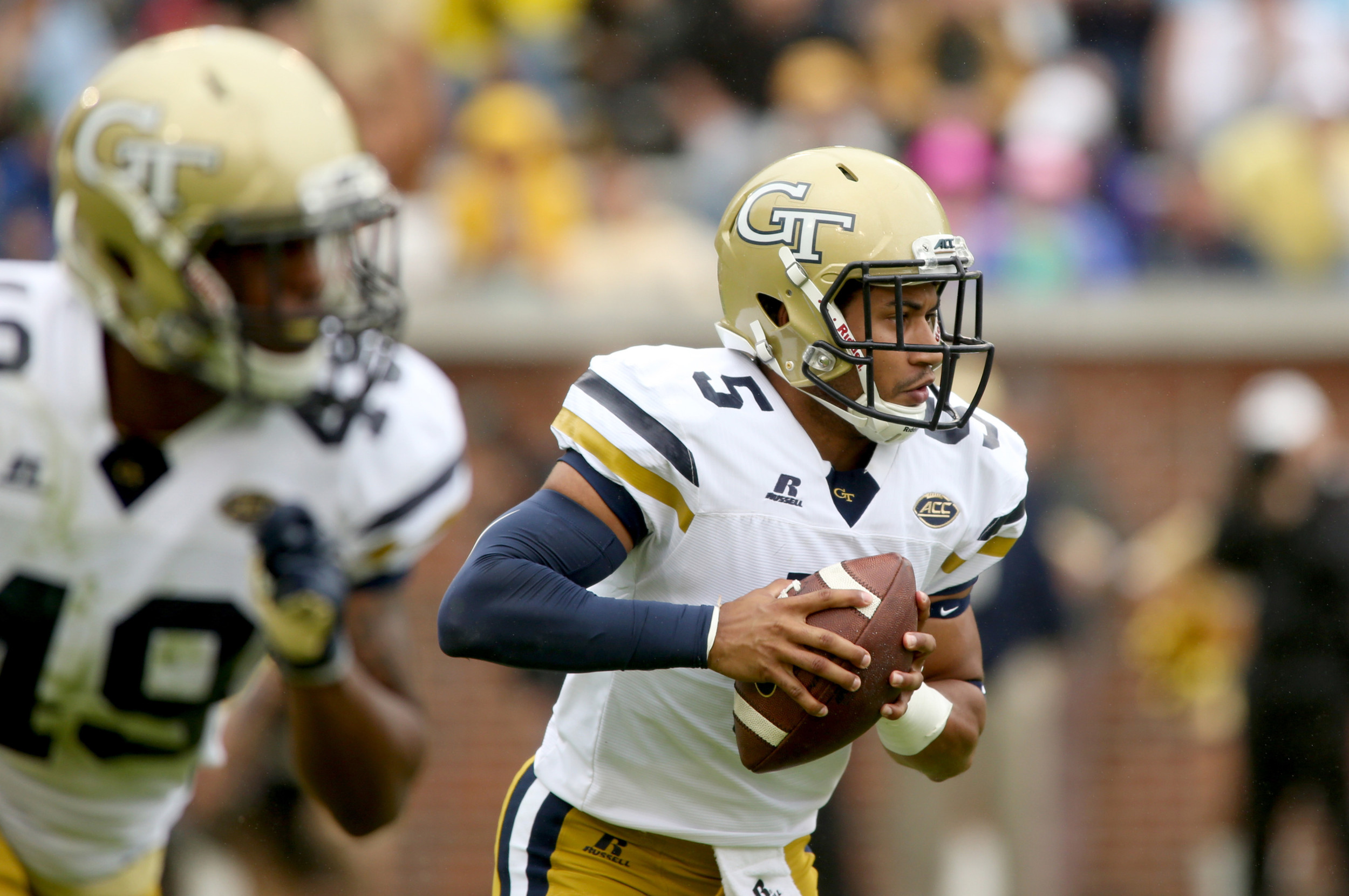 Justin Thomas runs in the first quarter of their game against the North Carolina Tar Heels. Jason Getz-USA TODAY Sports
