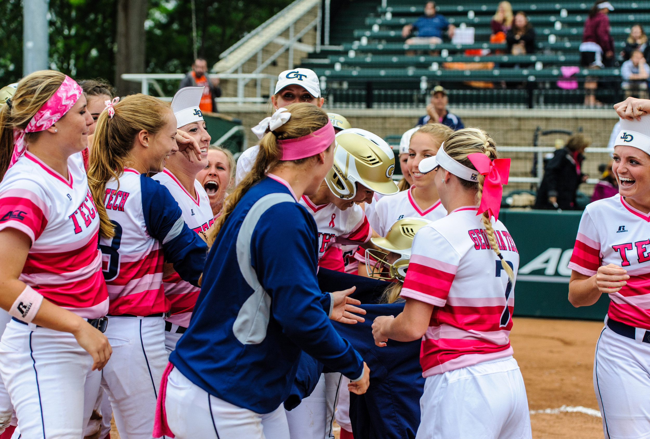 The team celebrates Maddie Lionberger's walk-off HR