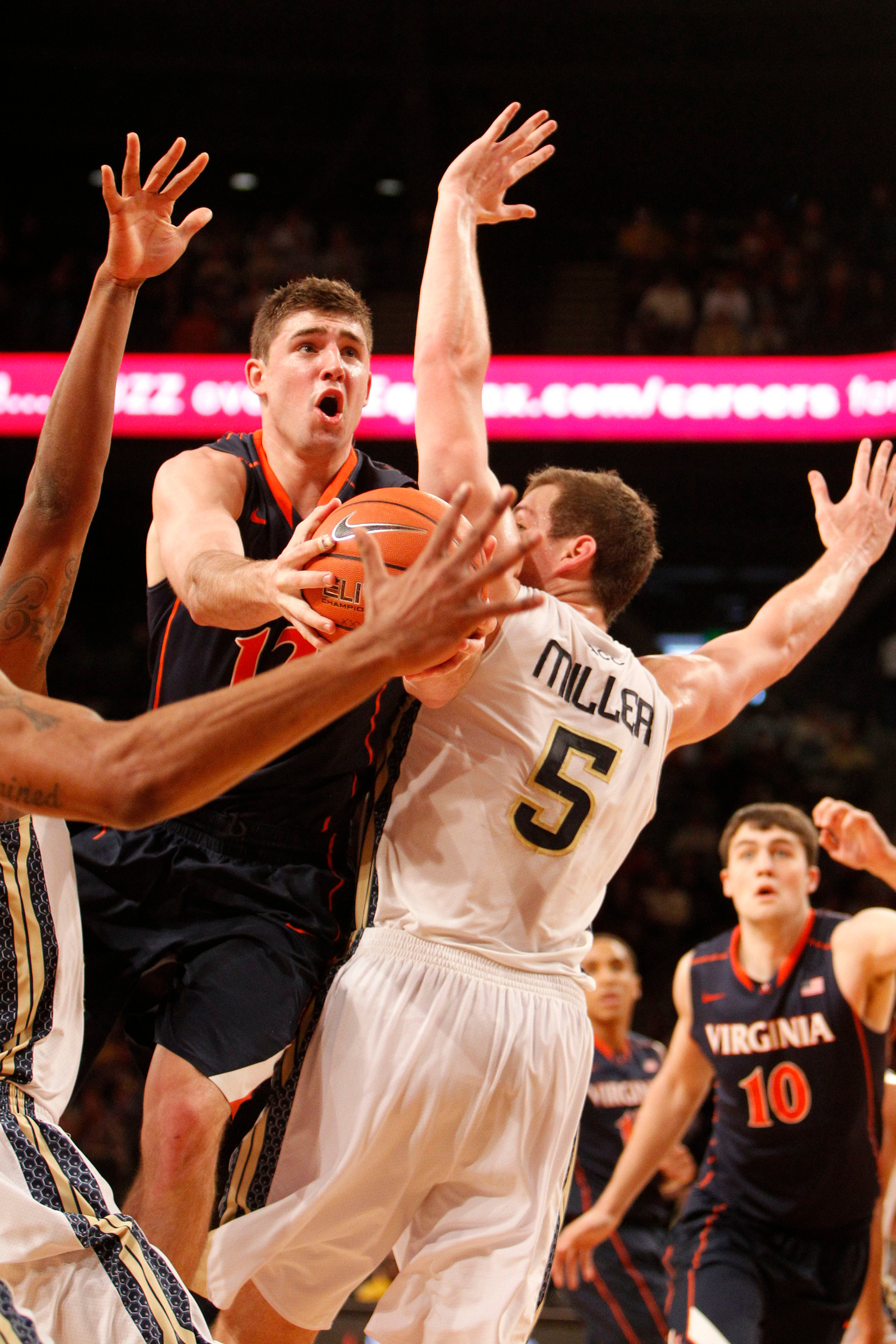 Feb 8, 2014; Atlanta, GA, USA; Virginia Cavaliers guard Joe Harris (12) shoots the ball against the Georgia Tech Yellow Jackets in the second half at Hank McCamish Pavilion. Virginia defeated Georgia Tech 64-45. Mandatory Credit: Brett Davis-USA TODAY Sports