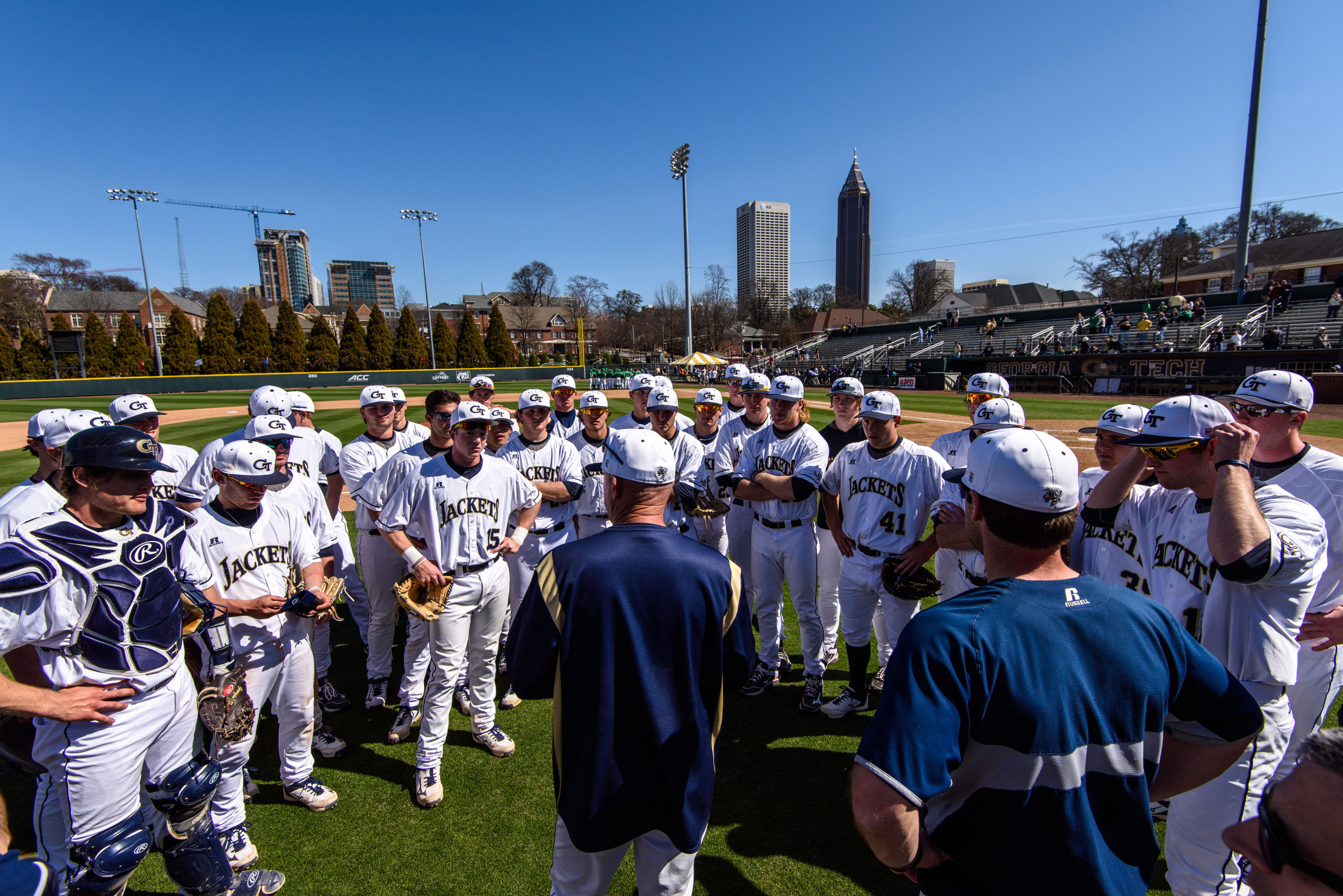 Coach Hall speaks to the team after the game