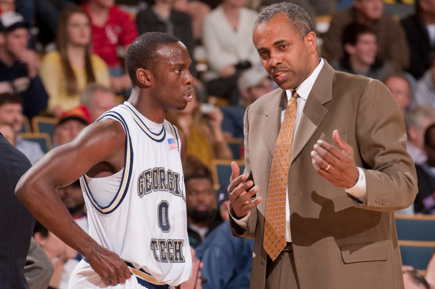 Georgia Tech coach Paul Hewitt talks with guard Mfon Udofia during a timeout in the second half against Kennesaw State in an NCAA college basketball game at Alexander Memorial Coliseum on Tuesday, Dec. 22, 2009, in Atlanta. Georgia Tech won 80-55. (AP Photo/Stanley Leary)