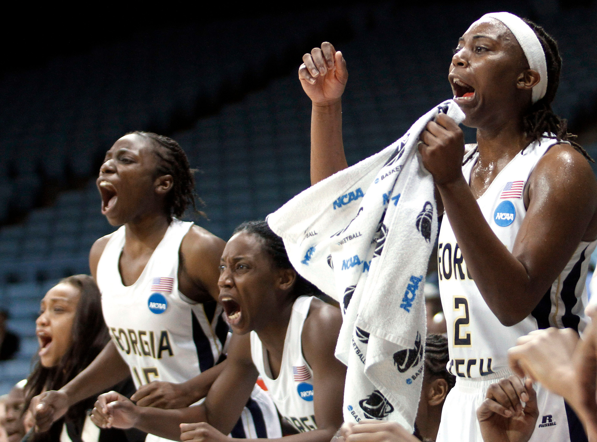 Mo Bennett, Metra Walthour,and Tyaunna Marshall celebrate. (AP Photo/Jim R. Bounds)