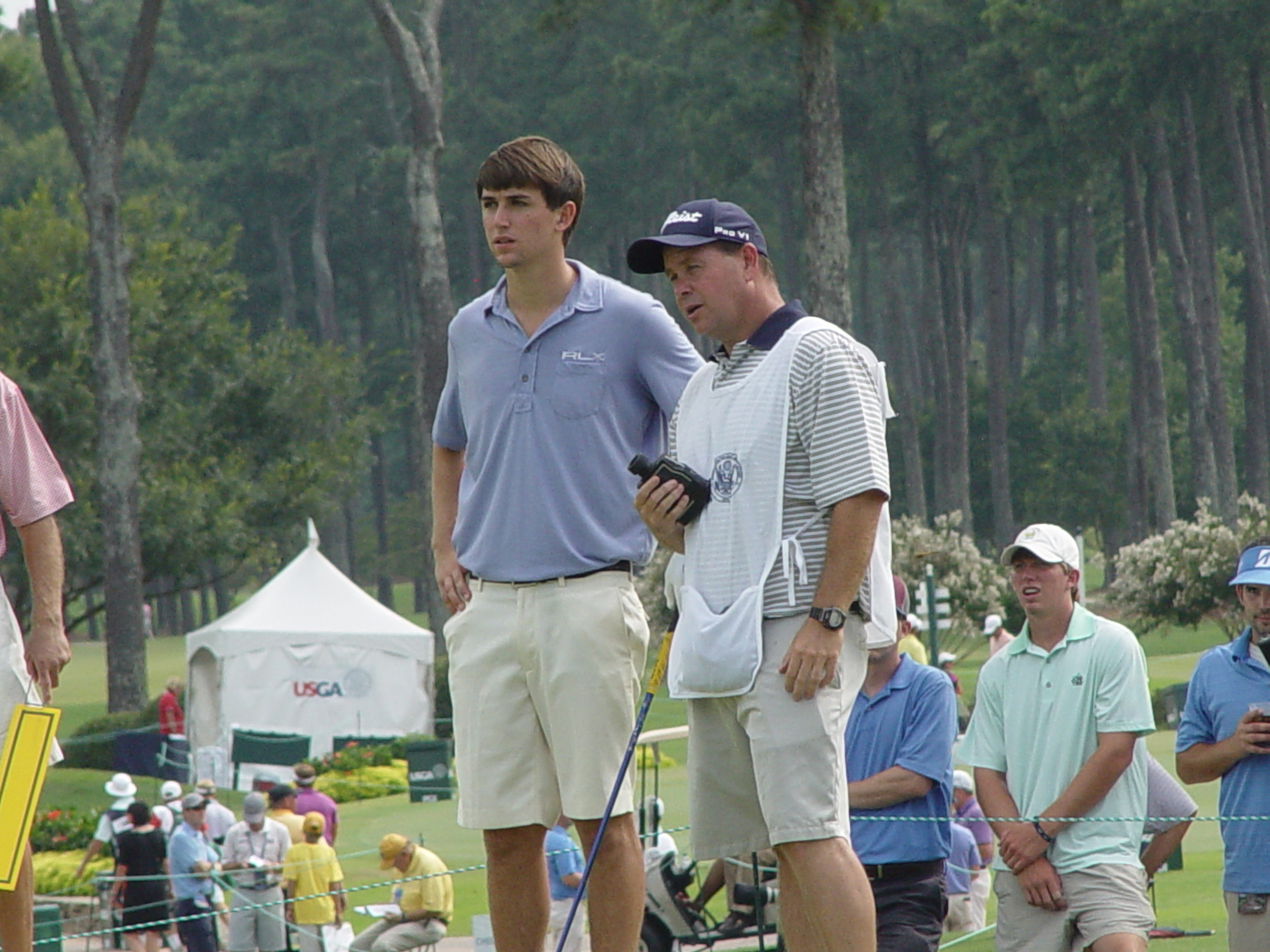 Ollie Schniederjans and caddie Lance Bailey during the first round of the U.S. Amateur championship, Highlands Course, Atlanta Athletic Club, August 8, 2014