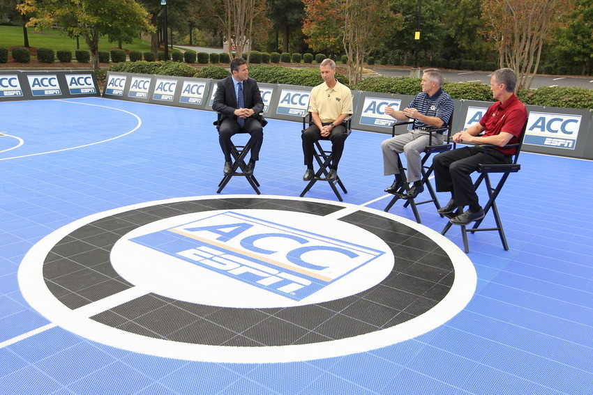 October 16, 2013 - Charlotte, N.C. - ERT: Host Andy Katz (l) with coaches Jeff Bzdelik (Wake Forest), Brian Gregory (Georgia Tech) and Steve Donahue (Boston College) during ACC Media Day (photo credit: Travis Bell/ESPN Images)