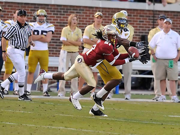 FSU's Patrick Robinson intercepts a fourth quarter pass intended for Tech's Demayius Thomas. Photo by LensEffects