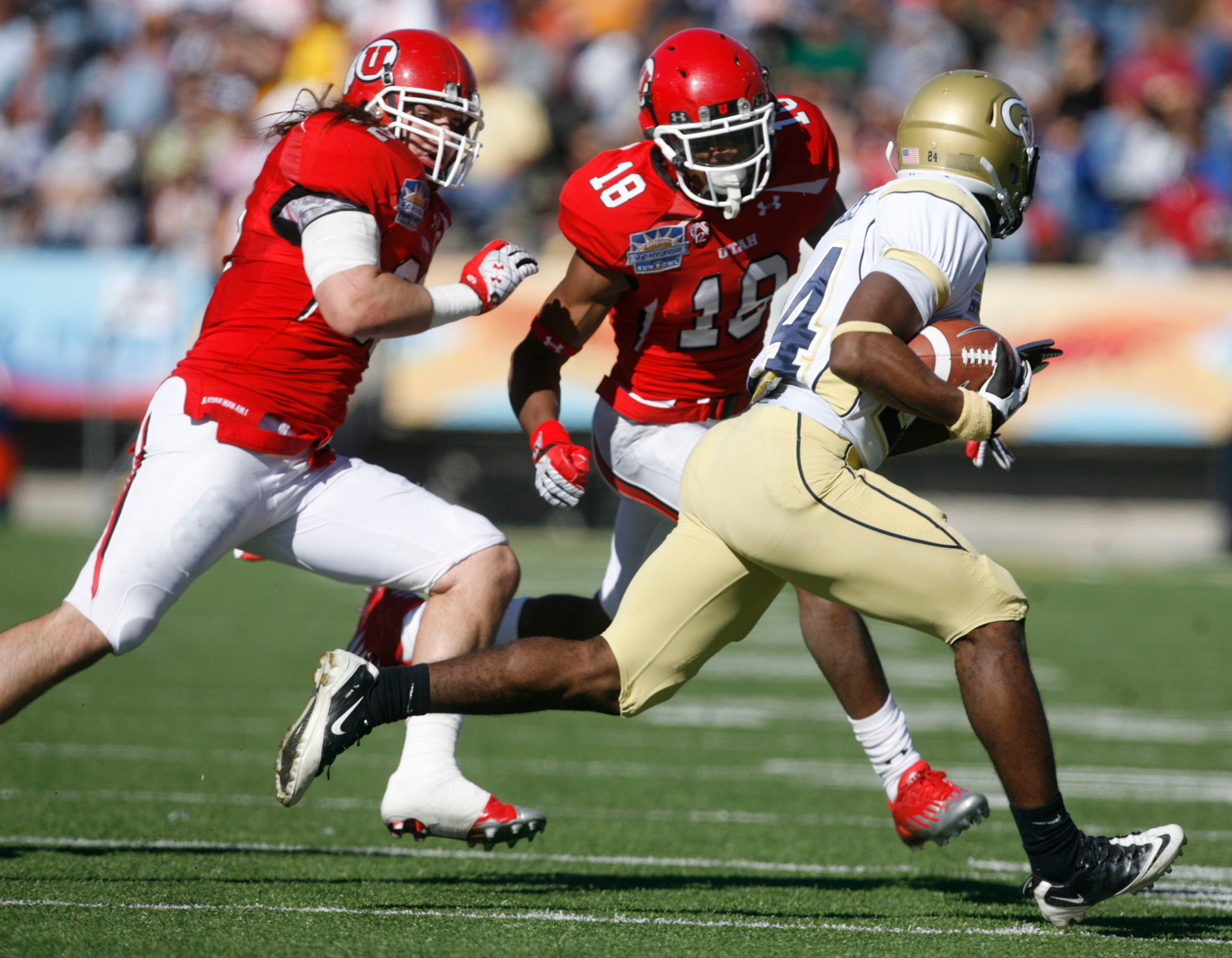 Utah's Chaz Walker and Eric Rowe chase down Georgia Tech's Embry Peeples during the first quarter in the Sun Bowl NCAA college football game on Saturday, Dec. 31, 2011, in El Paso, Texas. Utah won 30-27 in overtime. (AP Photo/The Salt Lake Tribune, Trent Nelson) DESERET NEWS OUT; LOCAL TV OUT