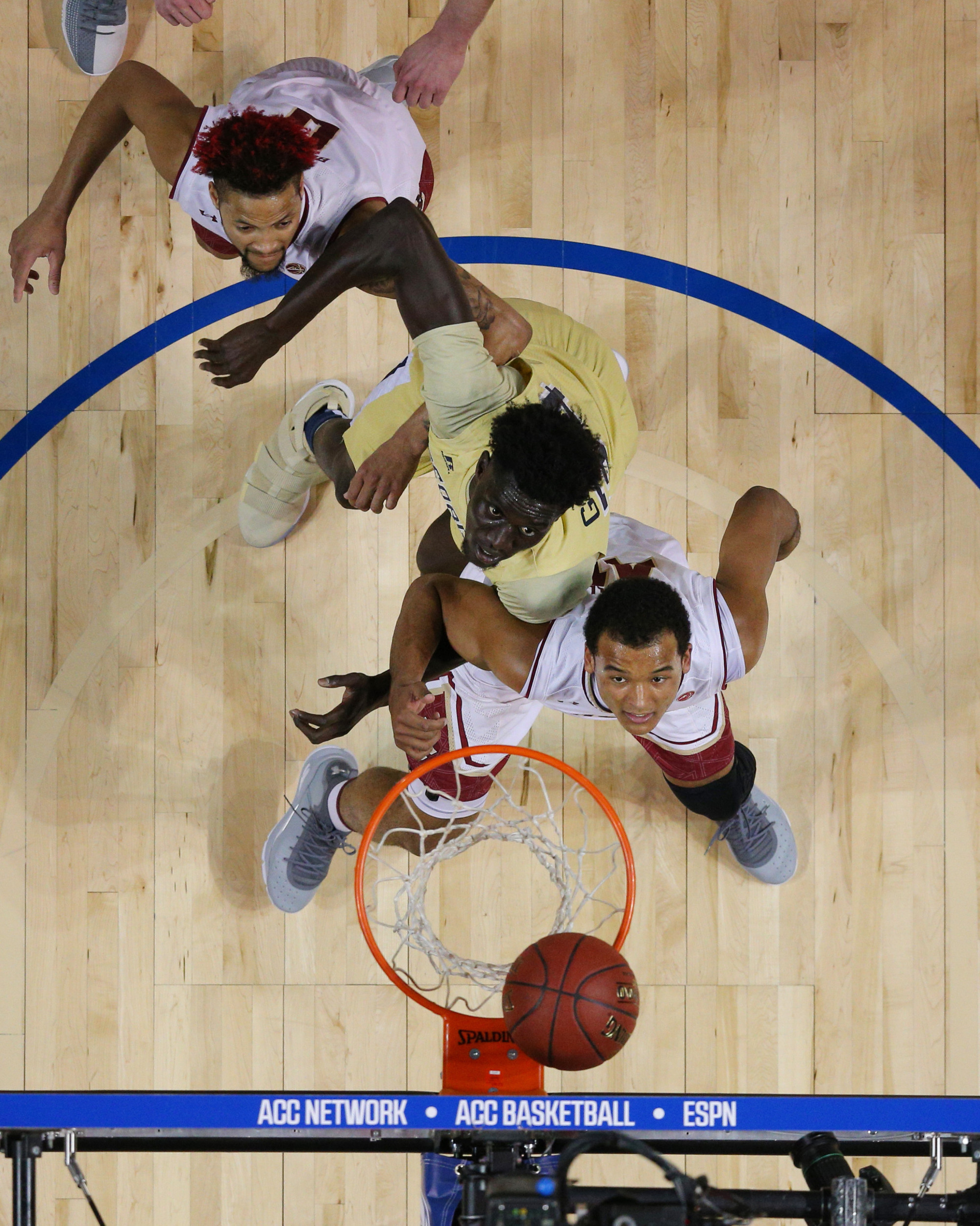 Mar 6, 2018; New York, NY, USA; Georgia Tech Yellow Jackets forward Abdoulaye Gueye (34) fights for position against Boston College Eagles guard Ky Bowman (0) and forward Steffon Mitchell (41) during the second half of a first round game of the 2018 ACC tournament at Barclays Center. Mandatory Credit: Brad Penner-USA TODAY Sports
