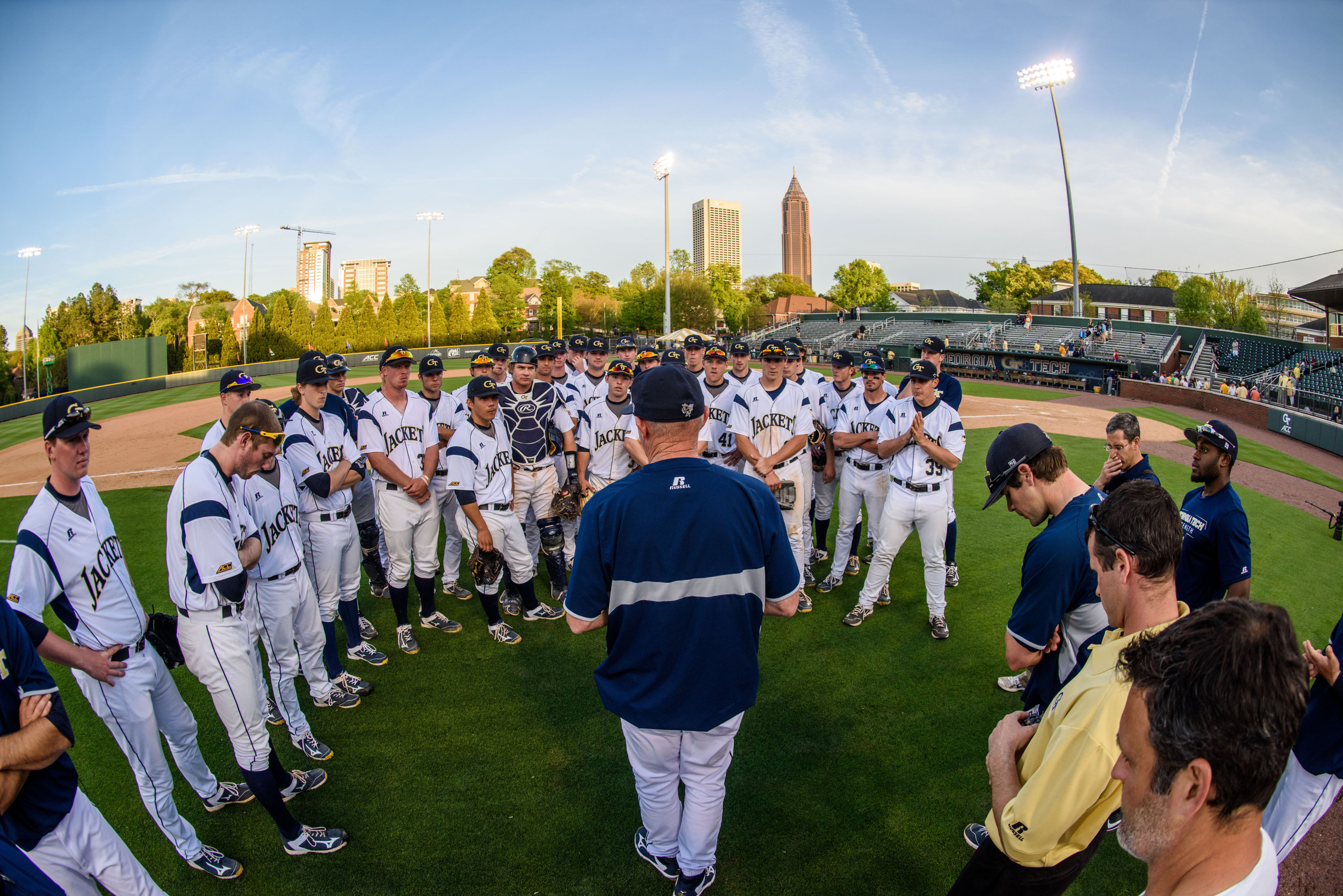 Coach Hall speaks to the team after the win