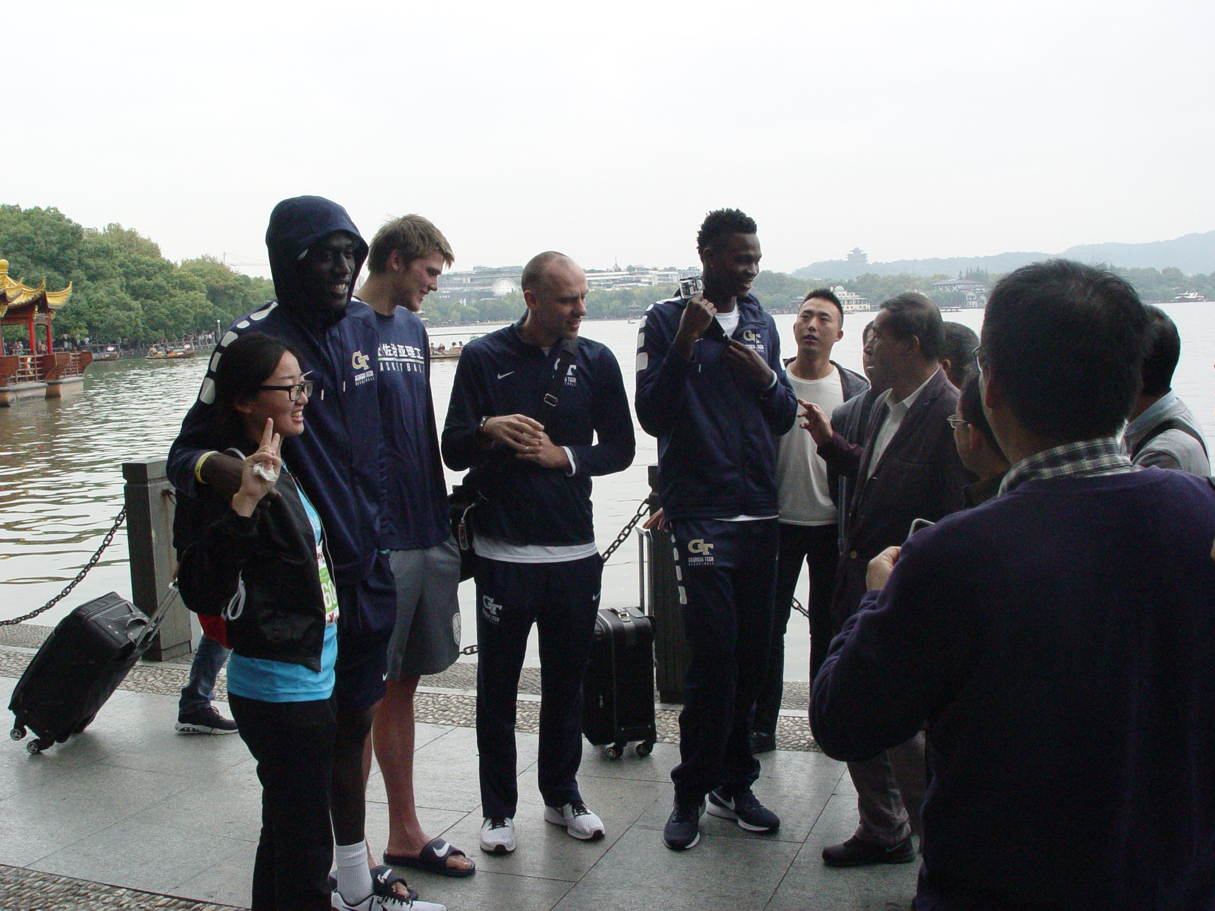 Georgia Tech men's basketball team, on their first full day in Hangzhou, China, leave the hotel for a morning walk, November 5, 2017