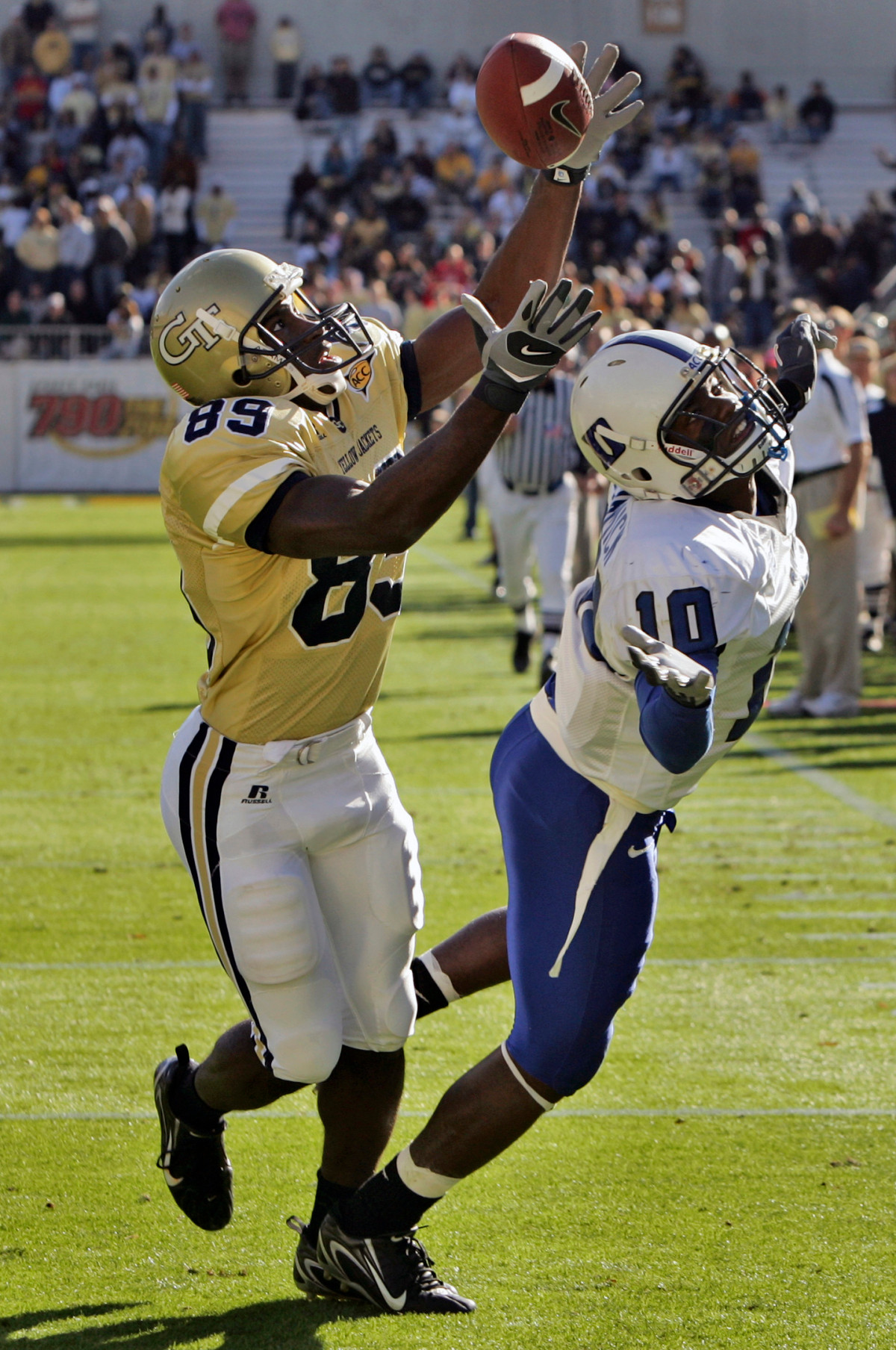 Georgia Tech's James Johnson (89) makes a catch for a touchdown as Duke's Deonto McCormick (10) defends in the second quarter of a college football game in Atlanta Saturday, Nov. 18, 2006. (AP Photo/John Bazemore)