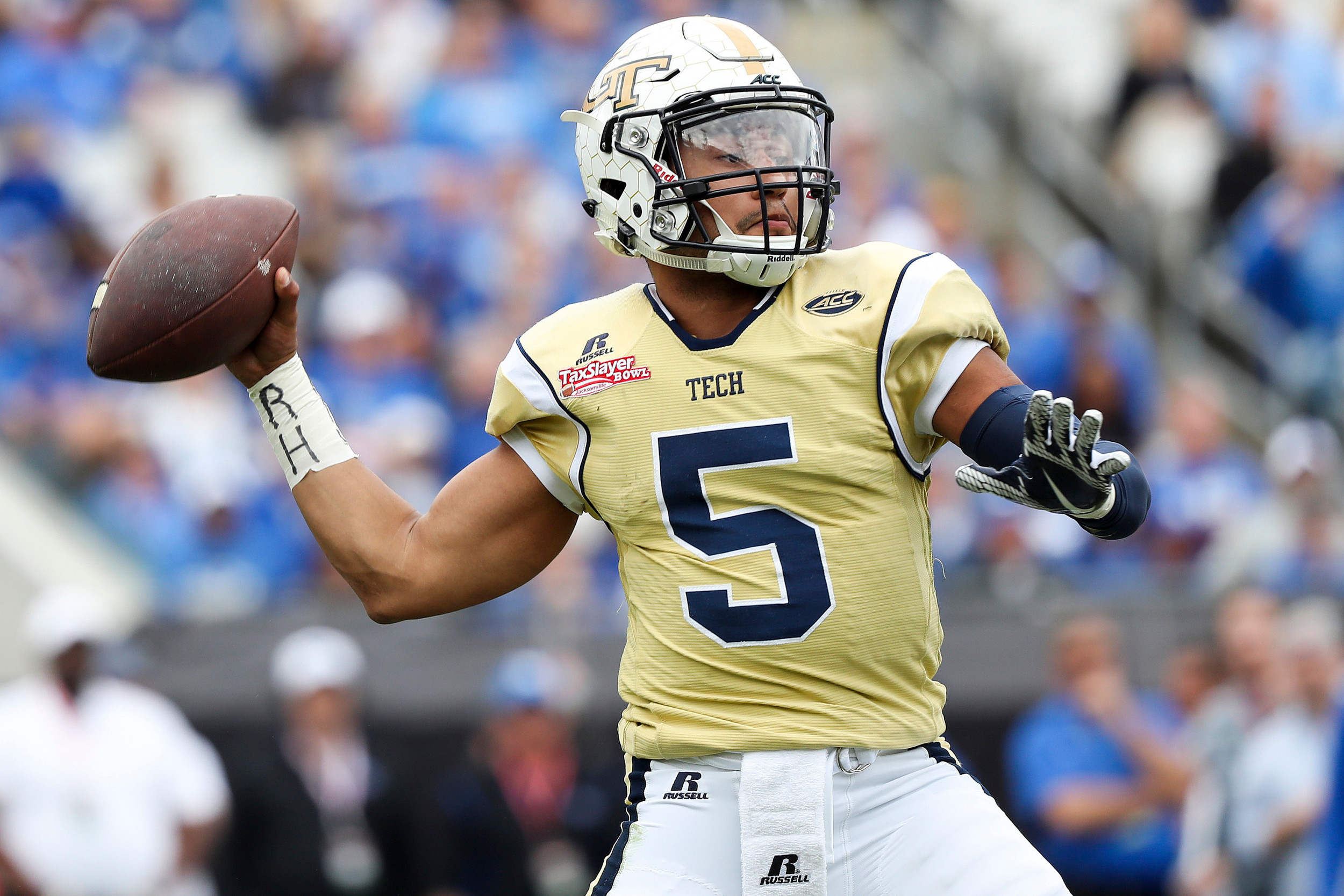 Georgia Tech Yellow Jackets quarterback Justin Thomas (5) looks to pass the ball in the second half against the Kentucky Wildcats at EverBank Field. Logan Bowles-USA TODAY Sports