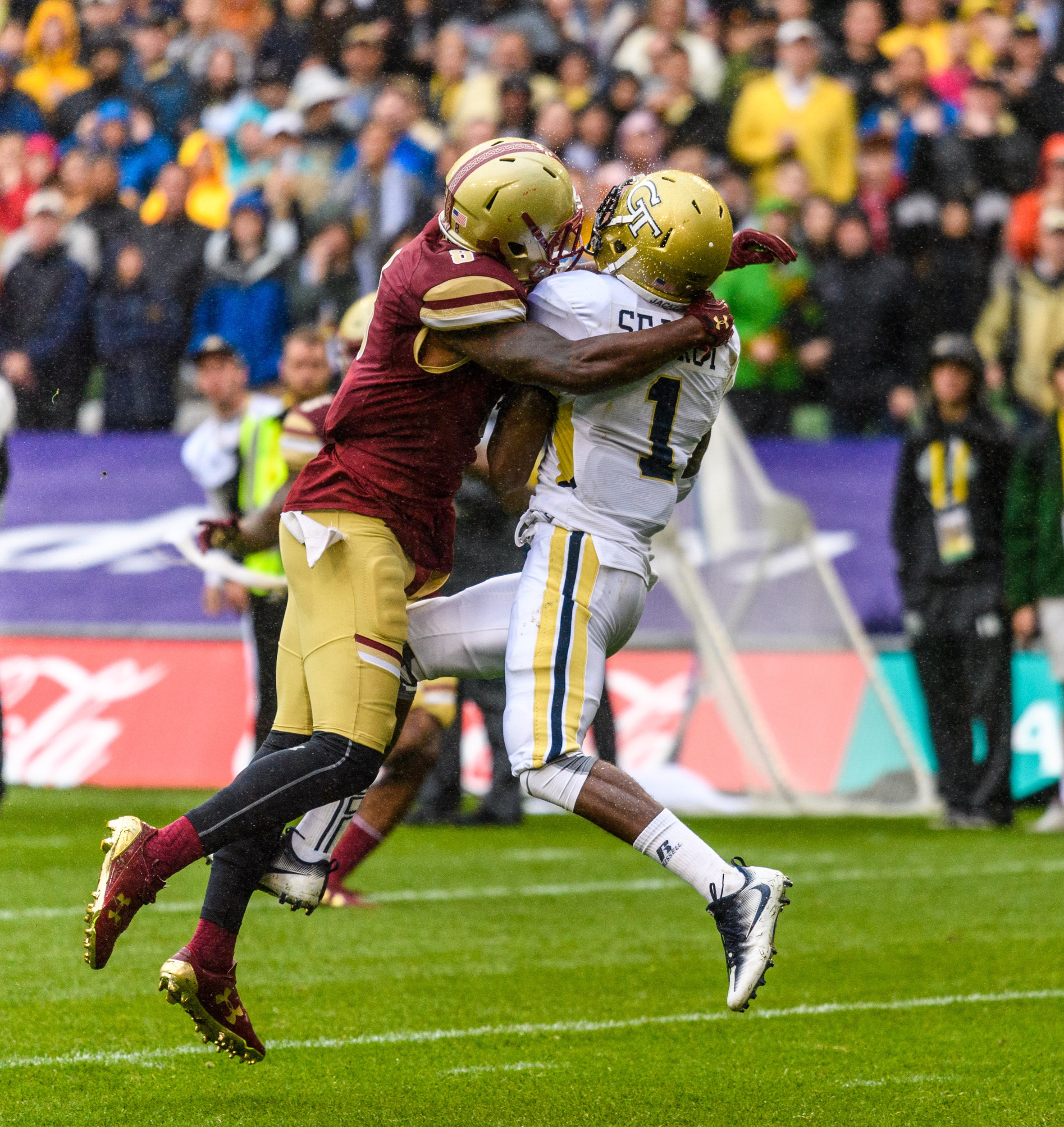 Georgia Tech A-Back Qua Searcy (1) catches a pass through Boston College Defensive Back William Harris (8) during the first half of an NCAA football game, Saturday, Sept. 3, 2016, in Dublin, Ireland. (Danny Karnik/Georgia Tech via AP)