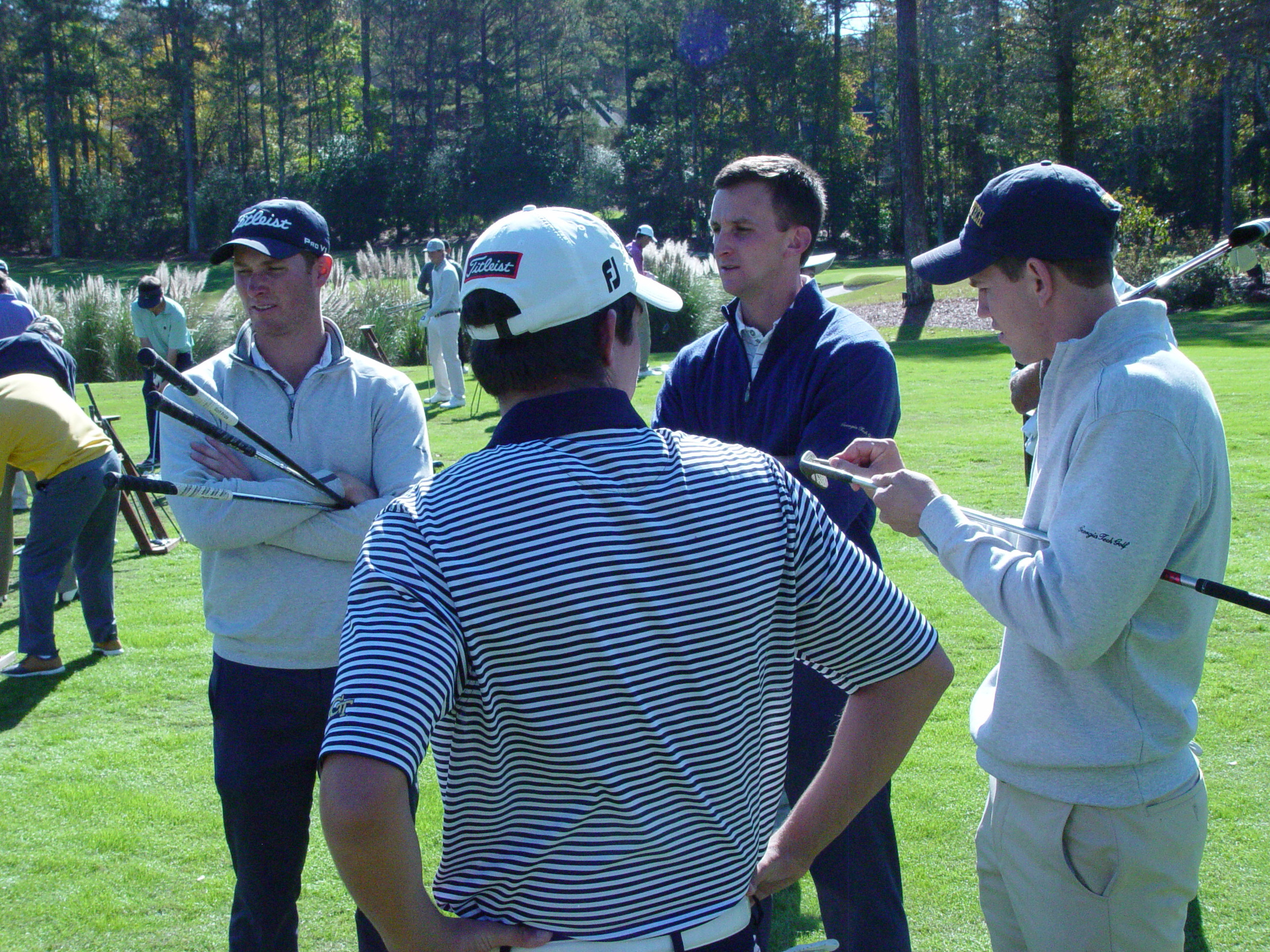 Former Jackets Vincent Whaley (left) and Michael Hines (right) with assistant coach Drew McGee at the Ramblin' Wreck Cup, November 12, 2017