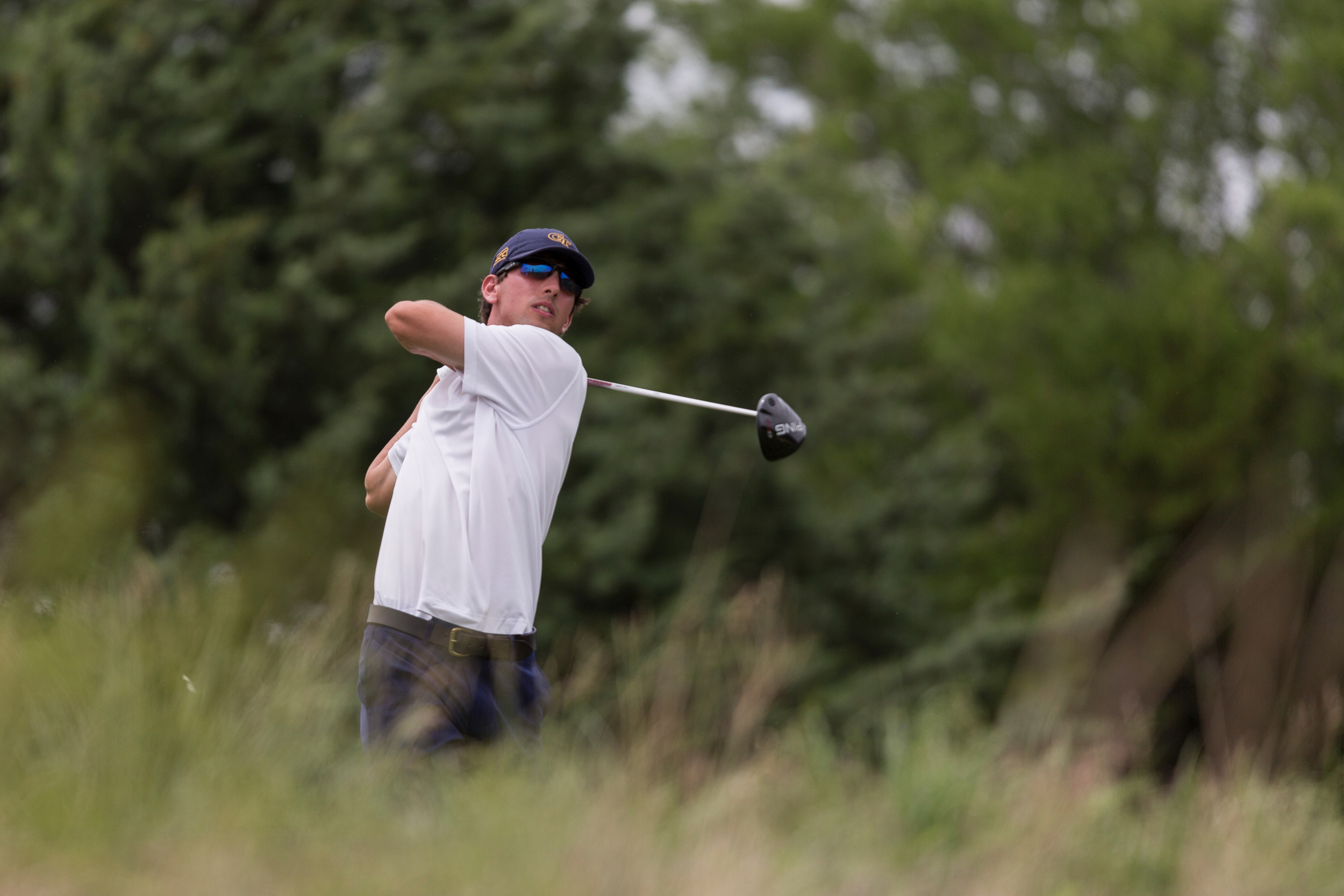 Seth Reeves tees off on 9th hole of Monday's round at the NCAA Golf Championship.