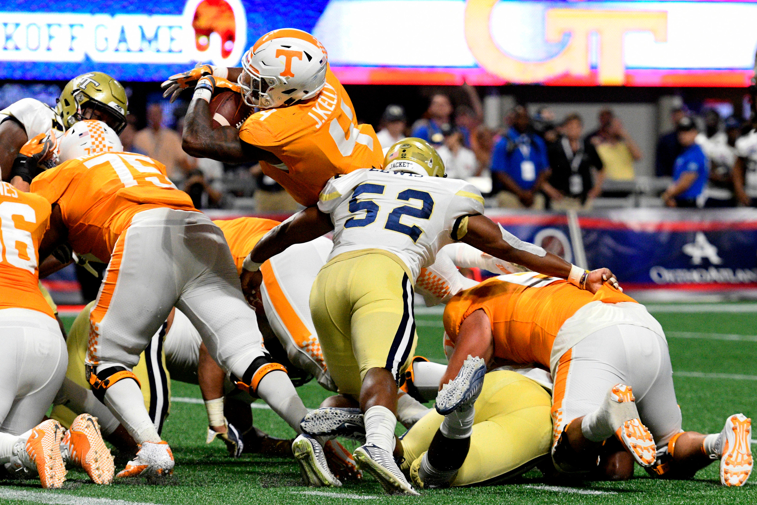 Sep 4, 2017; Atlanta, GA, USA; Tennessee Volunteers running back John Kelly (4) scores a touchdown against the Georgia Tech Yellow Jackets during the second quarter at Mercedes-Benz Stadium. Mandatory Credit: Dale Zanine-USA TODAY Sports