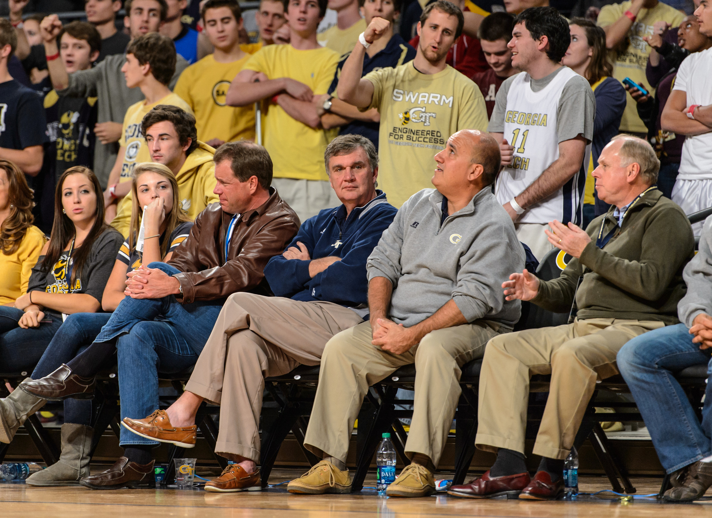 Coach Paul Johnson takes in the game from court side.