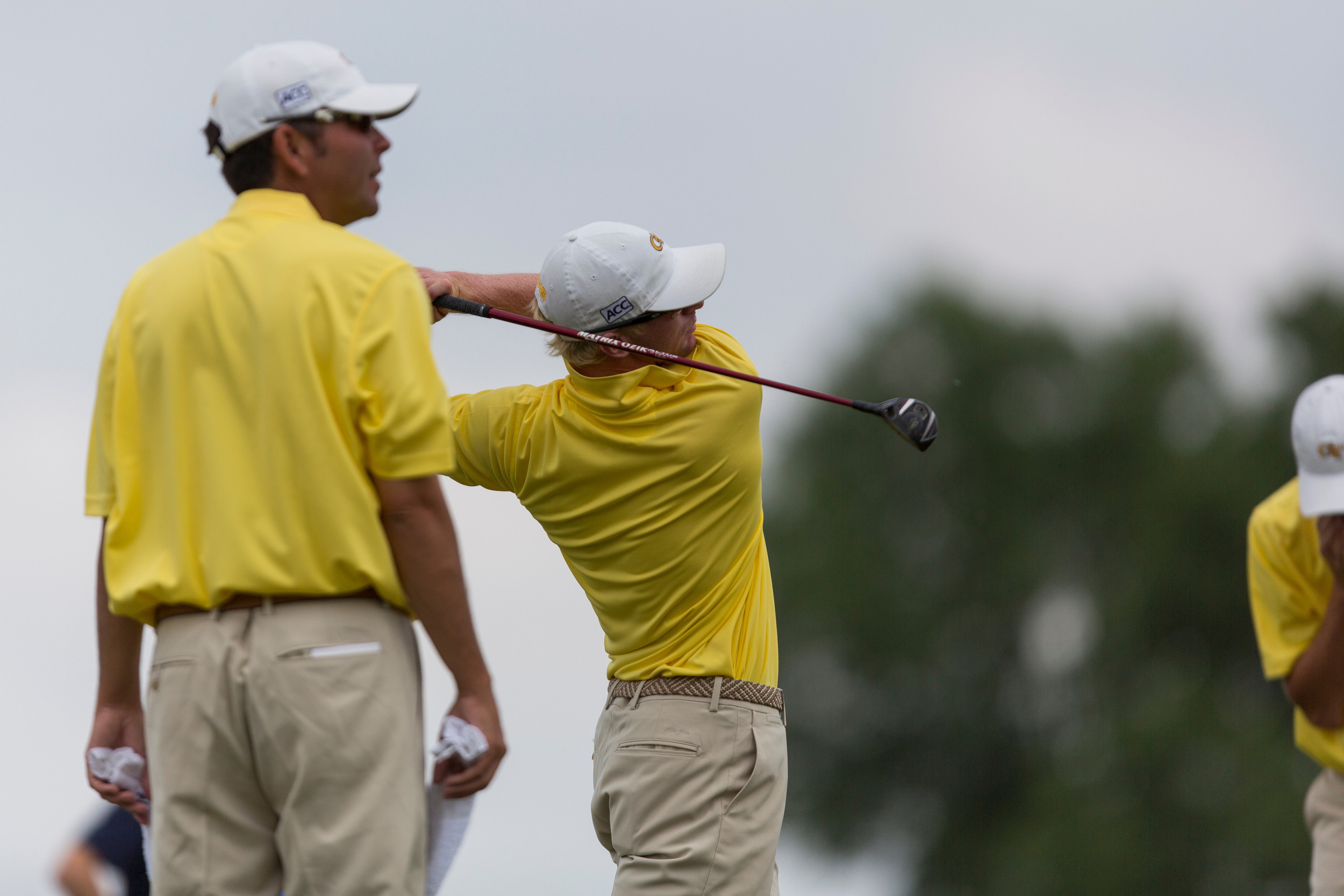 Anders Albertson with Assistant Coach Brennan Webb on the practice tee, Sunday May 25, 2014