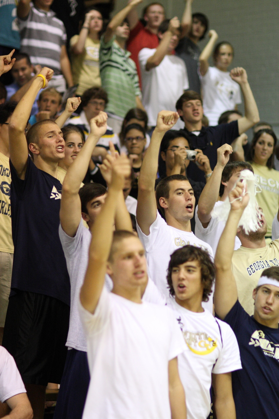 Fans cheering on the Yellow Jackets