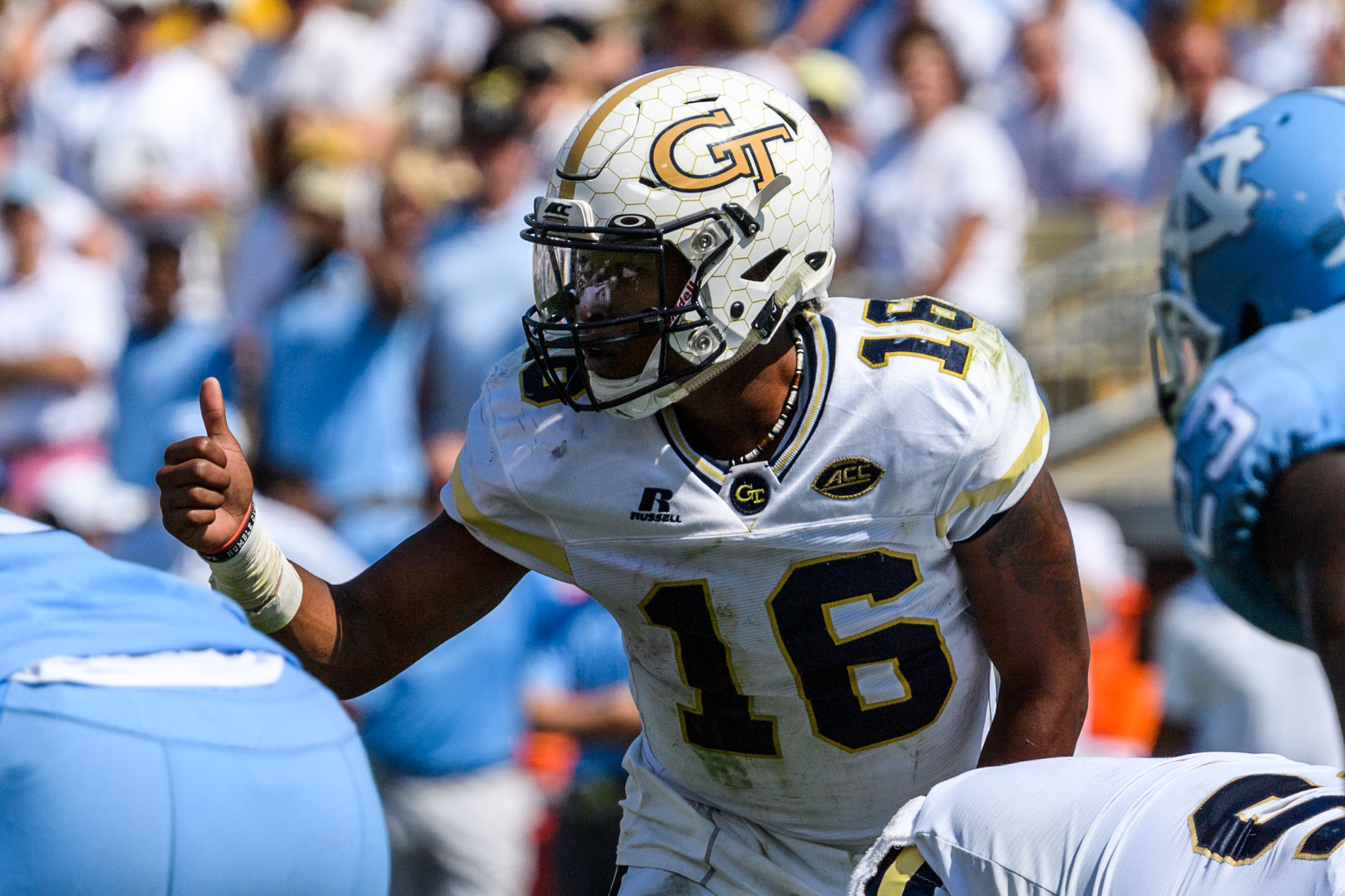 TaQuon Marshall (16) at the line of scrimmage before a snap.