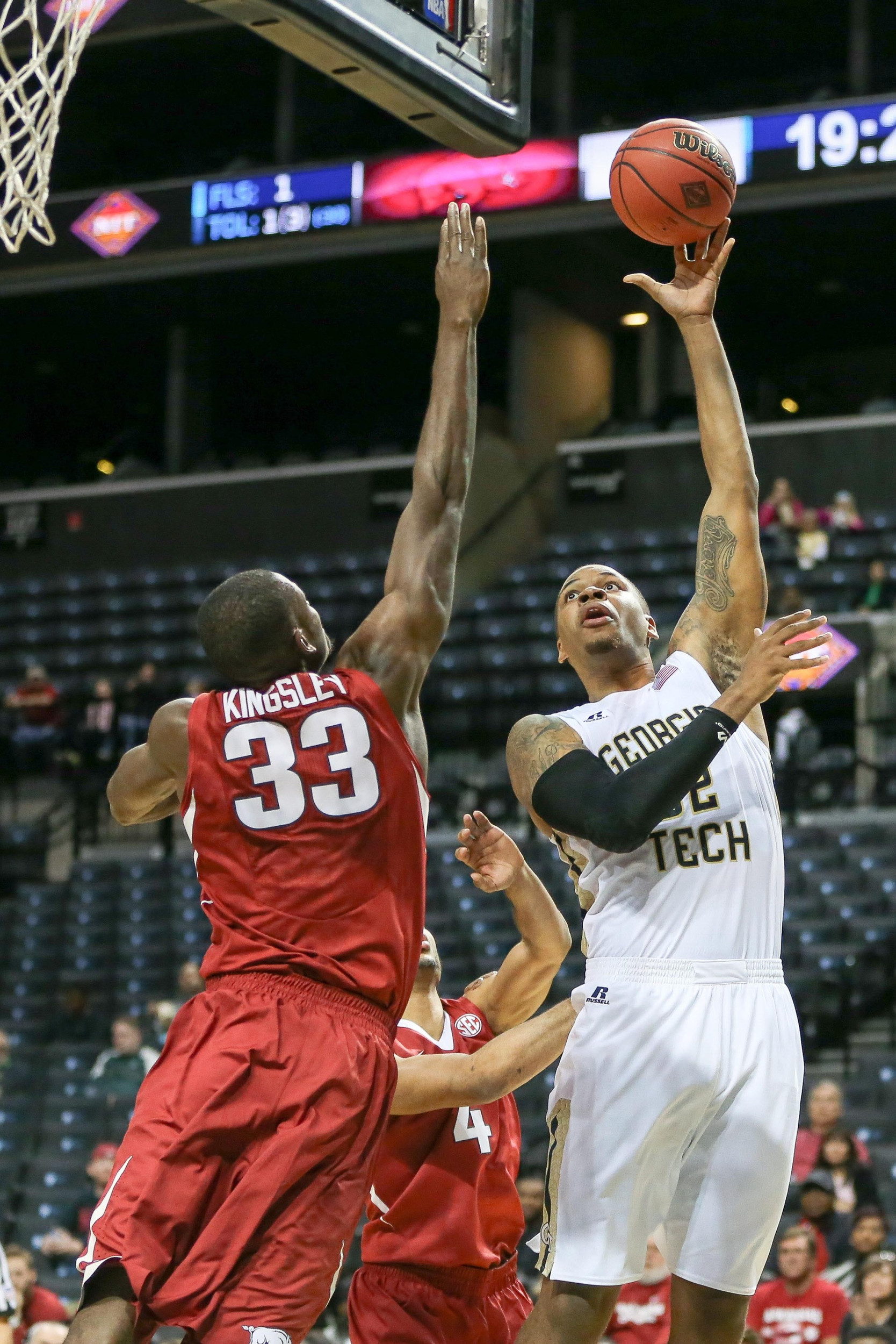 Nick Jacobs shoots while being defended by Arkansas Razorbacks forward Moses Kingsley. Vincent Carchietta-USA TODAY Sports