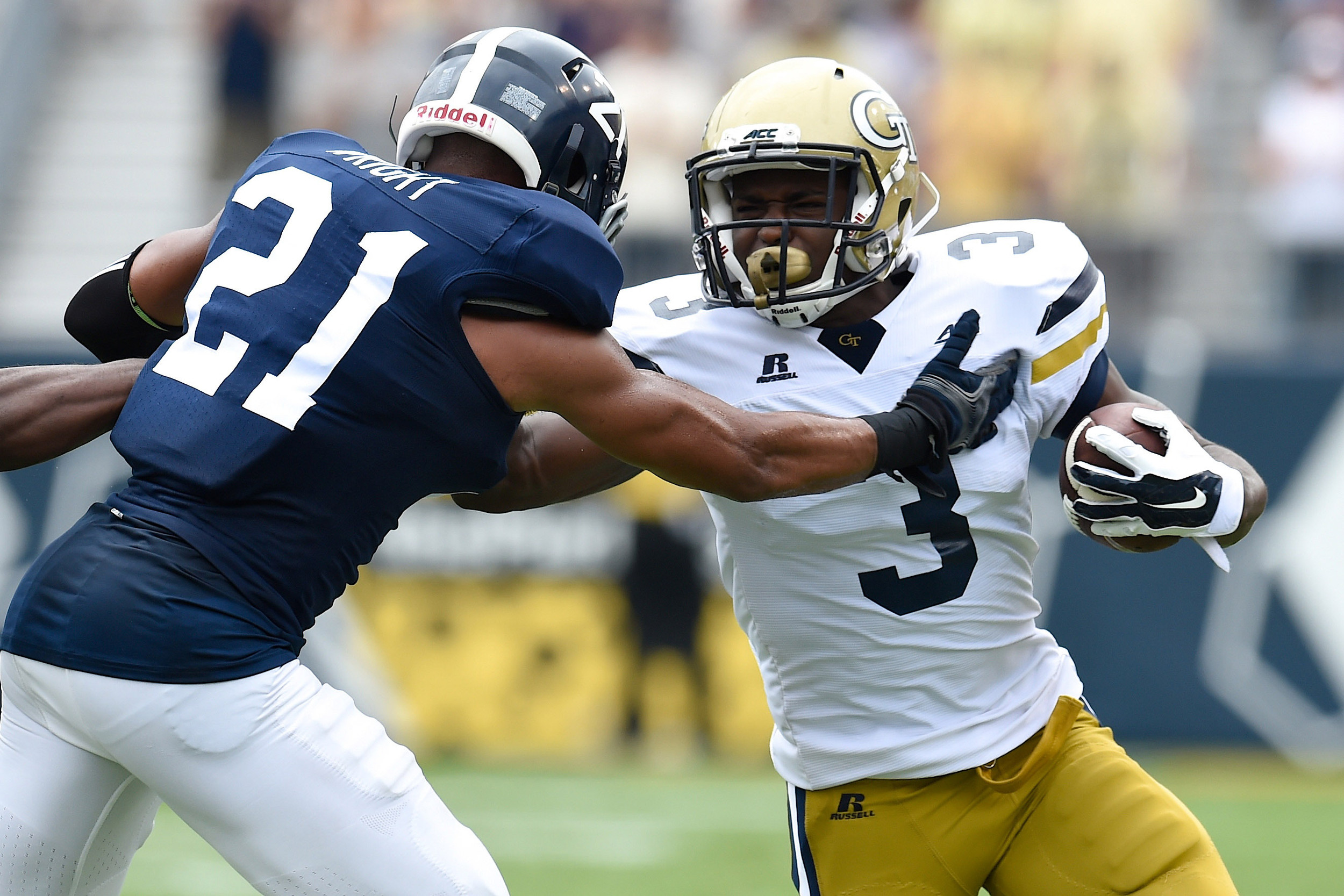 Sep 13, 2014; Atlanta, GA, USA; Yellow Jackets running back Dennis Andrews (3) tries to prevent a tackle by Georgia Southern Eagles cornerback Nick Wright (21) during the first half. Dale Zanine-USA TODAY Sports