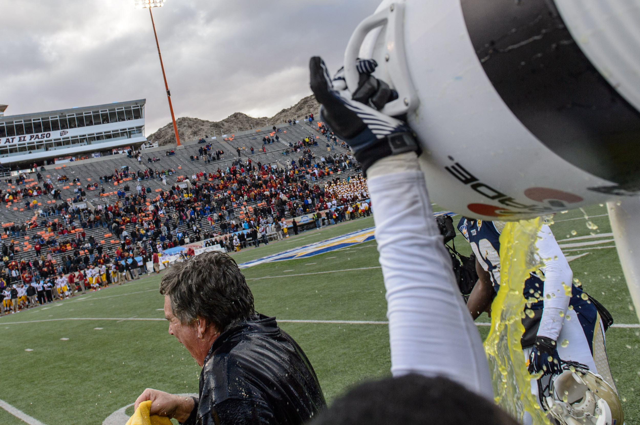 Coach Paul Johnson gets doused with Powerade as the Jackets beat the Trojans.