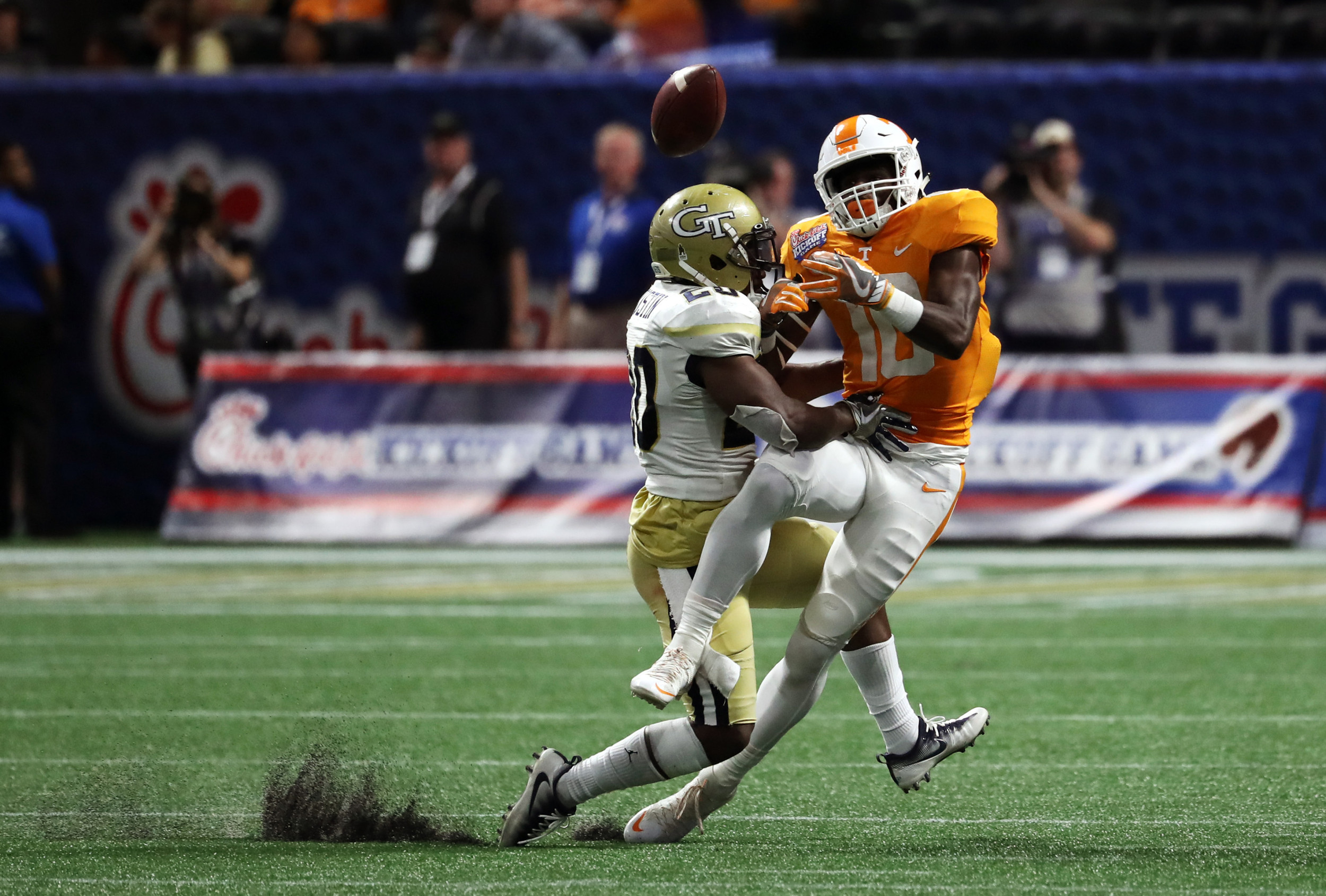 Sep 4, 2017; Atlanta, GA, USA; Georgia Tech Yellow Jackets defensive back Lawrence Austin (20) breaks up a pass against Tennessee Volunteers wide receiver Tyler Byrd (10) during the forth quarter at Mercedes-Benz Stadium. Mandatory Credit: Jason Getz-USA TODAY Sports