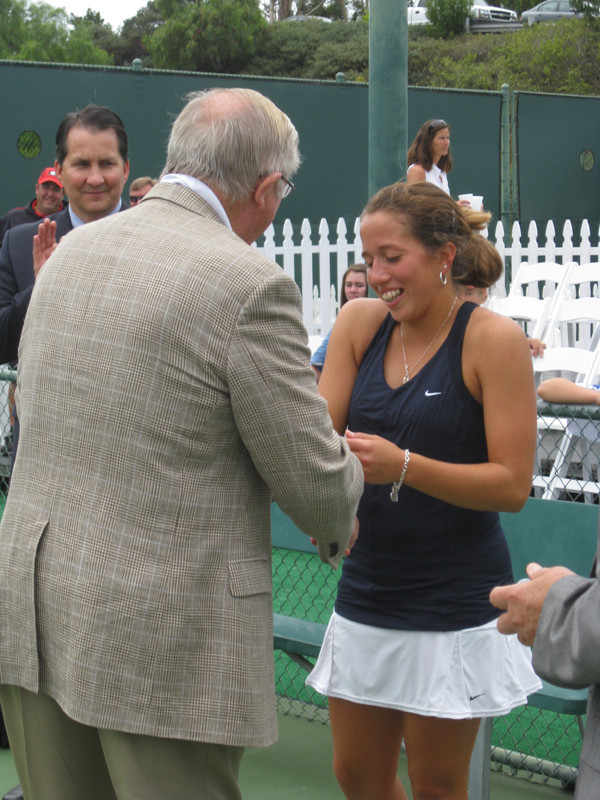 Irina Falconi gets her trophy for winning the singles title