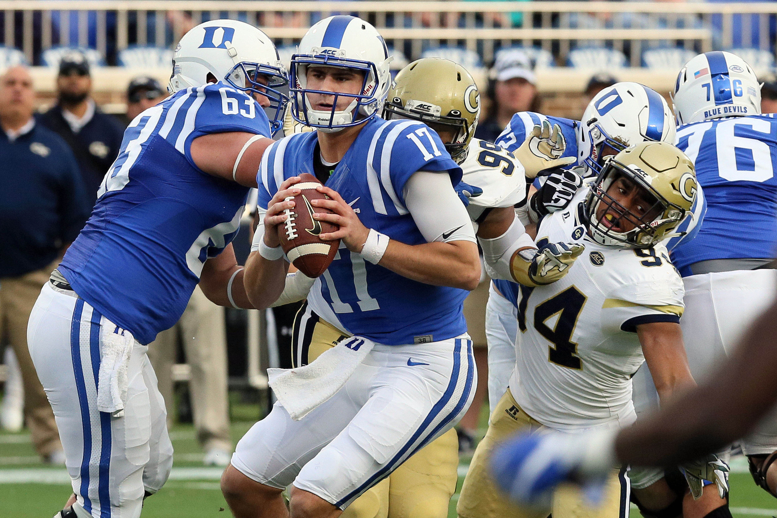 Nov 18, 2017; Durham, NC, USA; Duke Blue Devils quarterback Daniel Jones (17) looks for a receiver against the Georgia Tech Yellow Jackets defense in the first half at Wallace Wade Stadium. Mandatory Credit: Mark Dolejs-USA TODAY Sports